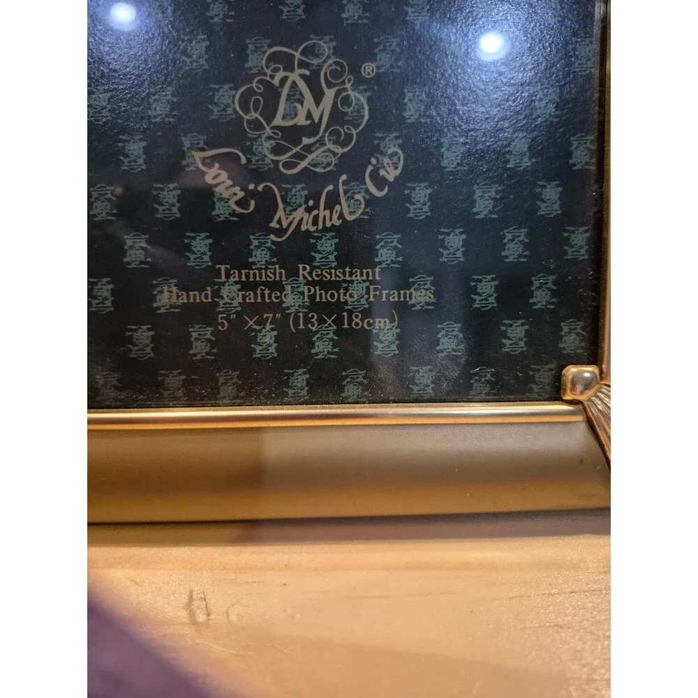 Elysees gold 5x7 picture frame, crafted with tarnish-resistant materials.